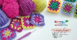 A képen fonalgomolyagok láthatóak