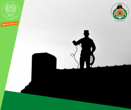 Kéményseprő tisztítja a kéményt.